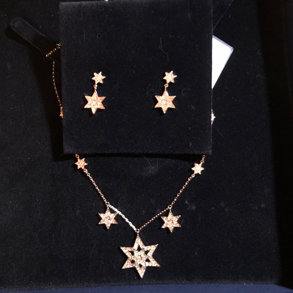 Swarovski star necklace and earring set; brand new